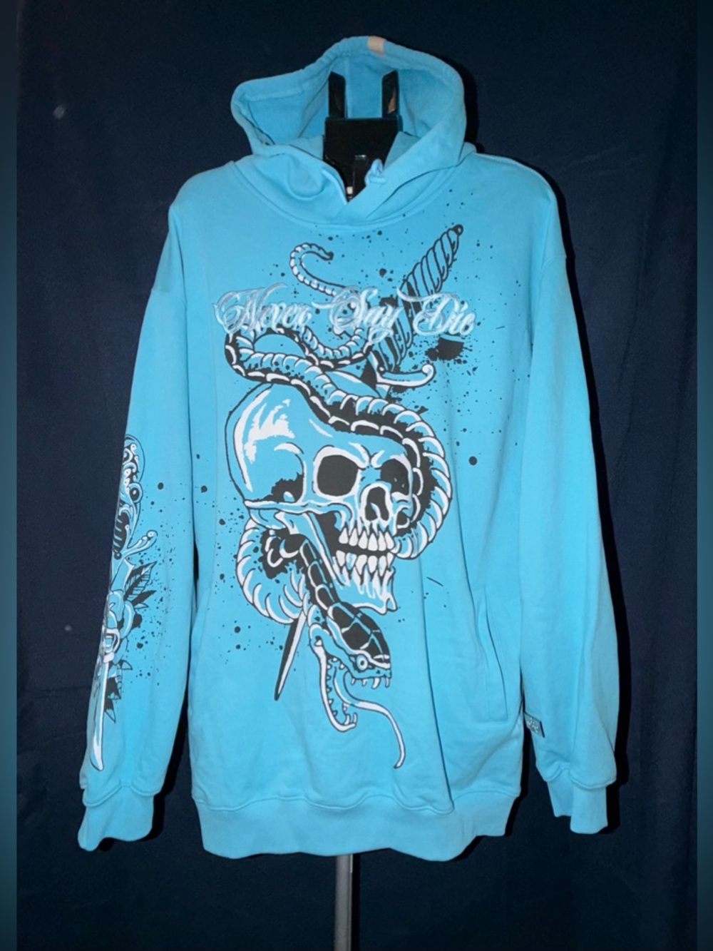 Watson “Never Say Die” Skull Hoodie – Carolina Blue (2XL)